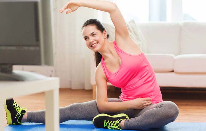 Girl exercising on Lauren Fox On Demand's online fitness programs